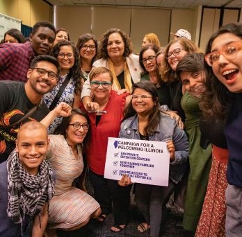 Group photo of people who attended the signing of the RISE Act
                  